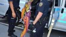 Nude Model Zoe West Arrested during a public body painting exhibition by Andy Golub